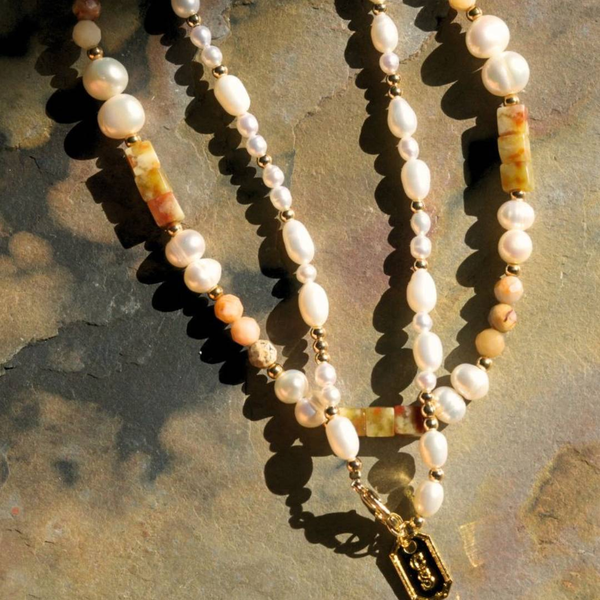 The Art of Pearl Knotting in Jewelry-Making: Enhancing Pearls' Natural
